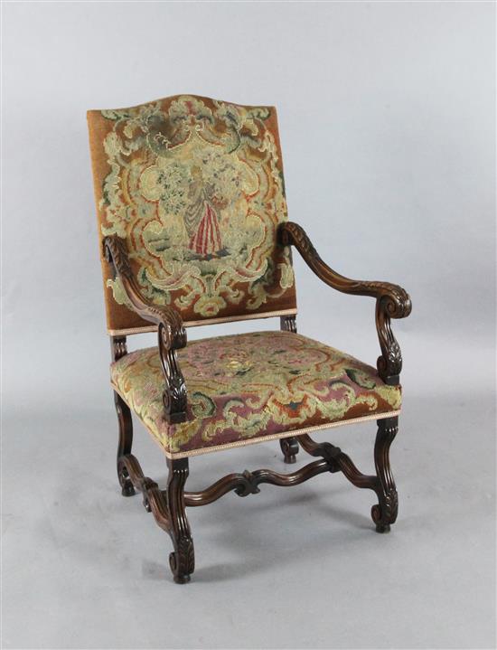 A Louis XIV style tapestry upholstered walnut fauteuil W.2ft 1in. H.3ft 9in.